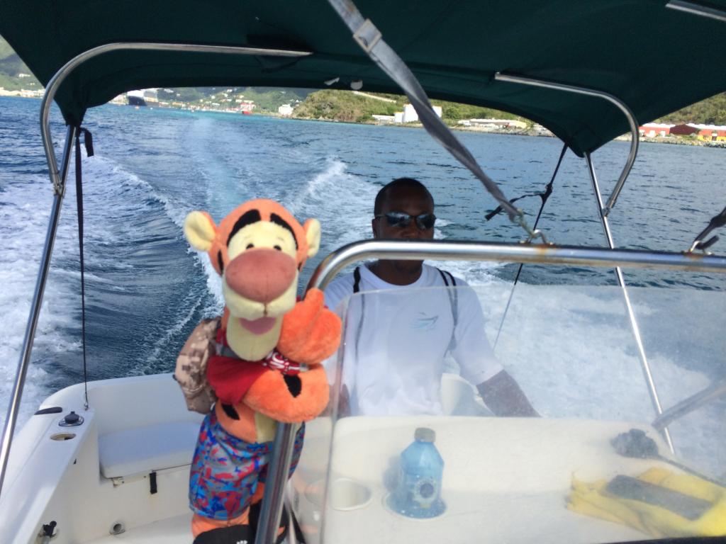 Click to enlarge image Tigger hangs on for DEAR LIFE as Captain Taiwo tried his best to put him at ease... Tiggers do not like water too much. - TRC Boating in the British Virgin Islands - Part 1 of 5 - BVI Customized Excursion for a small group on a Private Boat