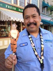 Click to enlarge image My friend Ray trades pins, so we had to stop and talk to Cast Member Ray. Believe it or not they share the same middle name, too, Anthony - Flat Tigger Goes to Disneyland - The continuing story of Ray's Flat Tigger