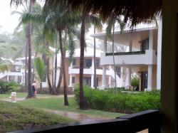 Click to enlarge image As seen from the safety of the Platinum Lounge in a tropicl downpour, This unit is the lower veranda on the first building on the right. - Video Tour Platinum Suite Bavaro Princess - Punta Cana, Dominican Republic