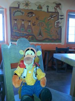 Click to enlarge image Tigger learns about local artists - Painted Desert Inn - Explore this intriguing national historic Landmark and discover its fascinating past from homesteads to Route 66! It is in the middle of the Painted Desert right on I-40!