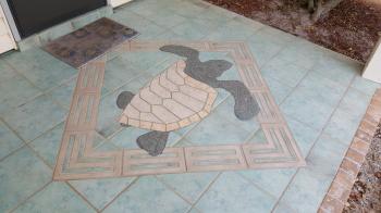 Click to enlarge image Back patio features nice decore in the floor tile. - Treasure of a Condo for Rent in Destin, Florida - Tigger has his favorite Condo in Miramar Beach, Florida with a pool and only a block from a public beach!