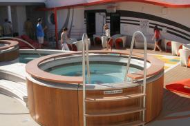 Tubs and lounging pools overlooking outdoor game board Tubs and lounging pools overlooking outdoor game board - Vibe; The New DCL Teen Hot Spot - New to the Disney Cruise Line is the expanded indoor/outdoor teens-only lounge on the Disney Dream