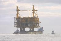 Click to enlarge image  - Going to Sea - Newly Constructed Oil Rig from the McDermott Yard 